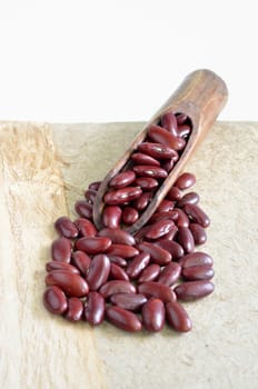 Red beans on wood
