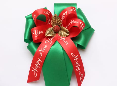 New year red and green bows isolated on white