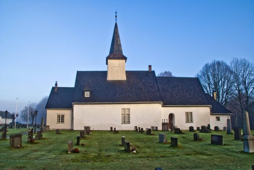 picture is shot in november 2012 and shows idd church, built around 1100 in halden municipality, the fog was pretty thick on idd so the picture got a little mysterious touch, idd church was badly damaged in an earthquake on sunday 23 october 1904, the quake occurred mid under church time, and the church was full of people, panic occured, but no one was injured, it was long a doubt about the church could be saved, but in 1922 it was completely restored