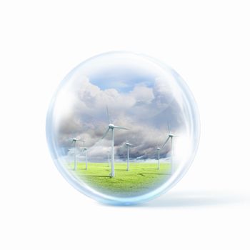 A group of wind turbines or windmills inside a glass sphere