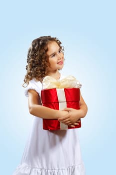 Portrait of an adorable preschool age girl wearing a Christmas holiday outfit