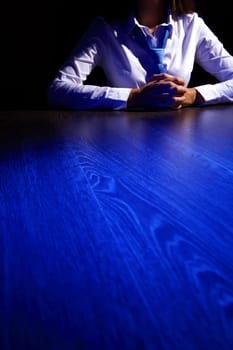 Business woman at office sitting at table