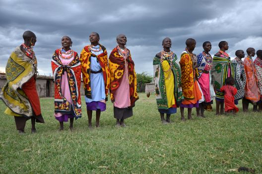Masai Mara,Kenya, October 17, 2011:Masai women with traditional clothes in a small villages in the Masai Mara