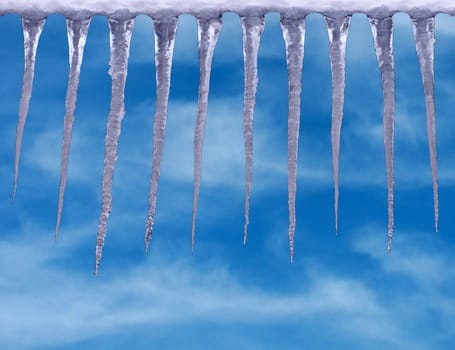 icicles over blue sky