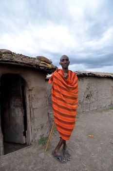 Masai Mara,Kenya, October 17, 2011: Masai man with traditional clothes in a small villages in the Masai Mara