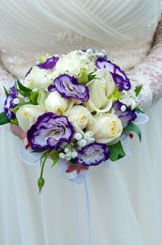 wedding bouquet of blue and white flowers