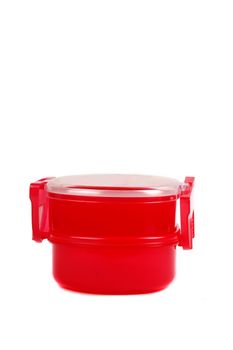 a red plastic container for preschoolers food stock isolated on white background