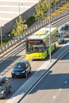 OSLO, NORWAY - SEPTEMBER 5: Public bus on a street of Oslo on September 5, 2012. One hour ticket cost 30 NOK, it's about 4 EUR.