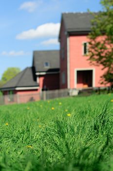 House behind grass