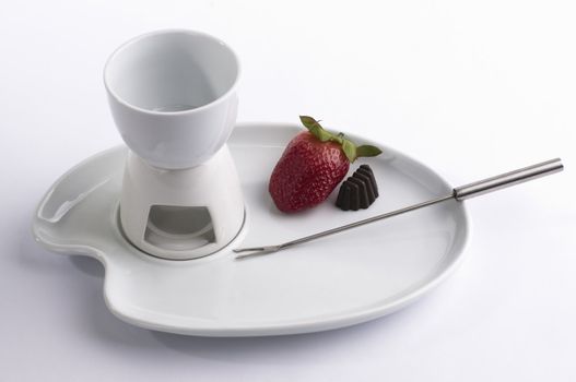 Fondue set and strawberry