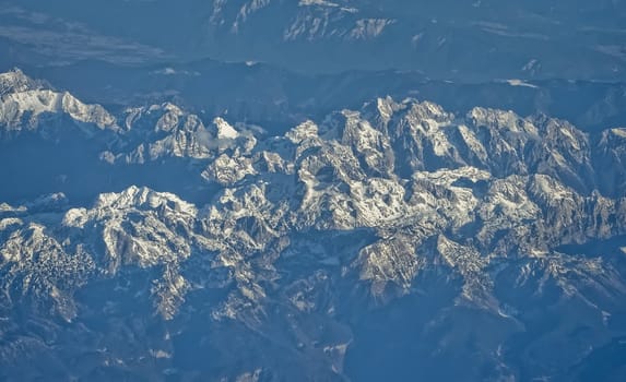 aerial view of Alps mountains from airplane