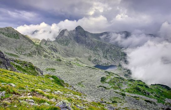 cloudy alpine landscape after rain