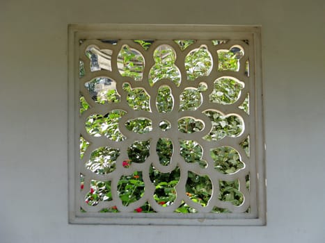 An oriental window in a garden in Santa Lucija, Malta.
