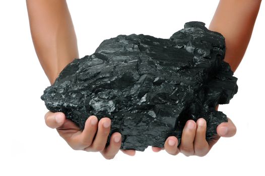 a big lump of coal is held with two hands isolated on white background