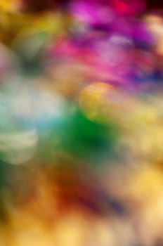 The abstract colorful christmas lights as background