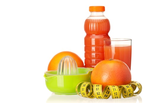 Fresh grapefruit juice with measure tape and grapefruit fruits on white background