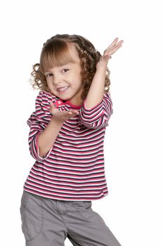 Portrait of emotionally pretty little girl on white background