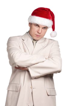 Portrait of handsome man in santa hat on white background