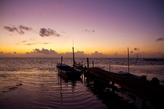 jetty at sunset, caye caulker, belize