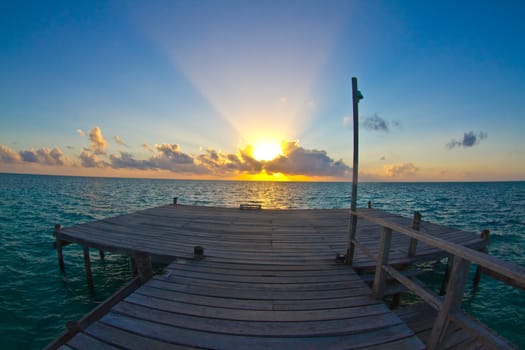 jetty at sunrise, caye caulker, belize