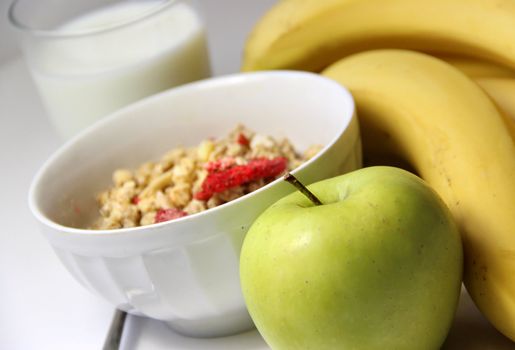 Healthy and fresh breakfast: muesli and fruits 