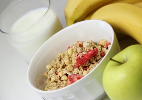 Healthy and fresh breakfast: muesli and fruits 