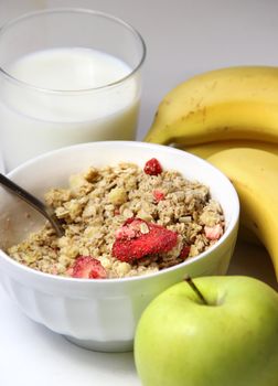 Healthy and fresh breakfast: muesli and fruits 