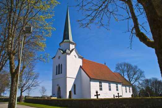 Rakkestad Church is the main church in the parish Rakkestad, Østfold. The church is a Romanesque medieval church with a rectangular nave and narrower and elongated choir, probably built ca. 1200. The church currently has 260 seats and is built in brick and stone.
