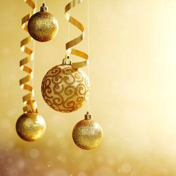 golden christmas balls on bokeh background