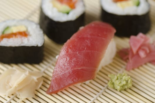 Japanese Cuisine, Sushi Set with tuna, sushi rolls, gari ginger and wasabi