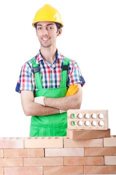 Builder with hard hat on white
