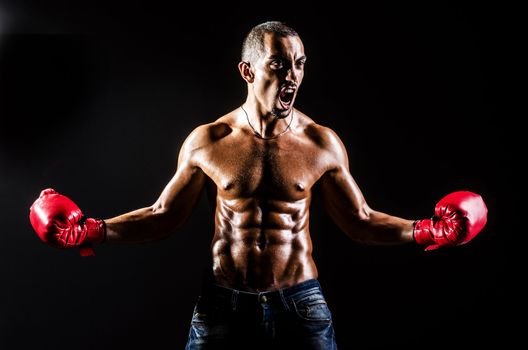 Young man with boxing gloves