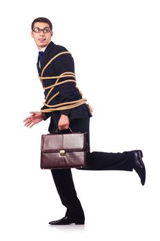 Businessman tied up with rope on white
