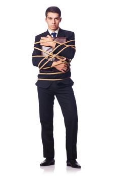 Businessman tied up with rope on white