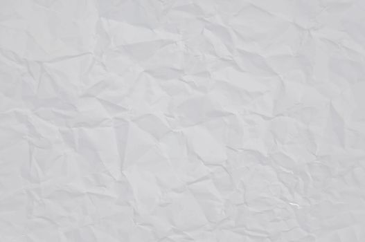 Crinkled sheet of white paper.