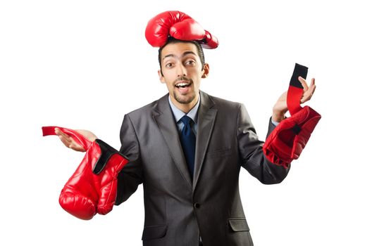 Businessman with boxing gloves on white