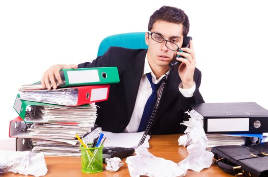 Busy stressed man in the office