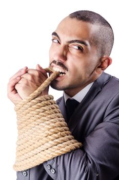 Businessman tied up with rope