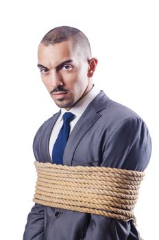 Businessman tied up with rope