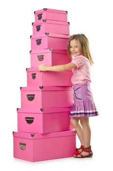 Little cute girl with lots of boxes