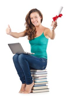 Student with netbook sitting on books