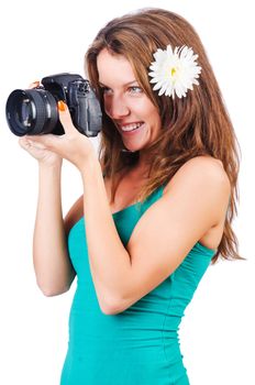 Attractive female photographer on white