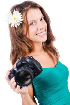 Attractive female photographer on white