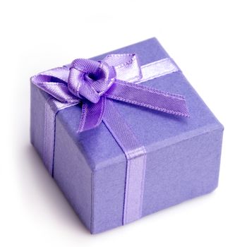 Small purple birthday gift box isolated on white background