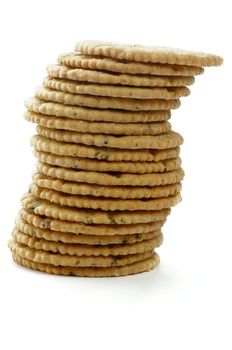 Stack of Dry Biscuits closeup isolated on white background