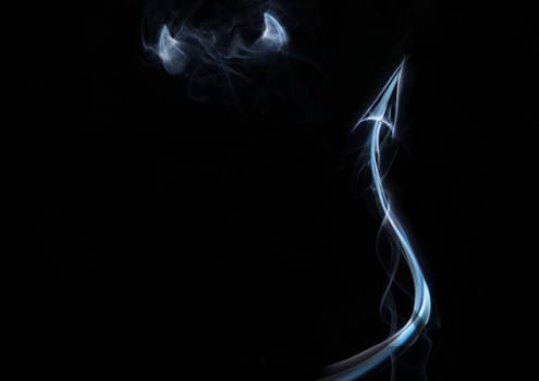 devil horns and a tail of smoke on a black background