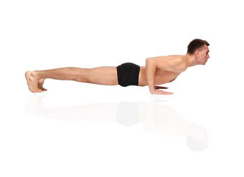 man practicing yoga in position