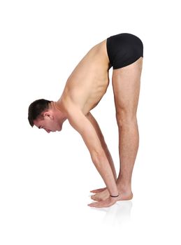 man practicing yoga in position