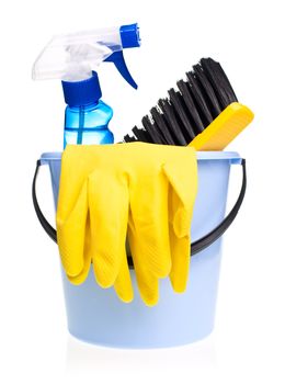 Plastic bucket with cleaning supplies on white background