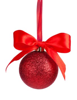 Red christmas ball with red bow over white background